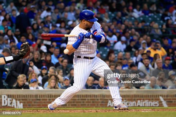 Willson Contreras of the Chicago Cubs is hit by a pitch during third inning in the game against the Pittsburgh Pirates at Wrigley Field on May 18,...