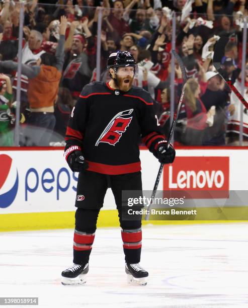 Ian Cole of the Carolina Hurricanes scores at 3:12 of overtime against the New York Rangers in Game One of the Second Round of the 2022 Stanley Cup...