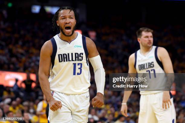 Jalen Brunson of the Dallas Mavericks celebrates a basket against the Golden State Warriors during the second quarter in Game One of the 2022 NBA...