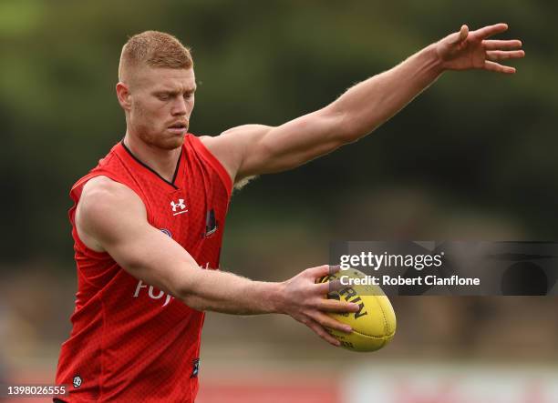 Peter Wright of the Bombers kicks the ballduring an Essendon Bombers AFL training session at The Hangar on May 19, 2022 in Melbourne, Australia.