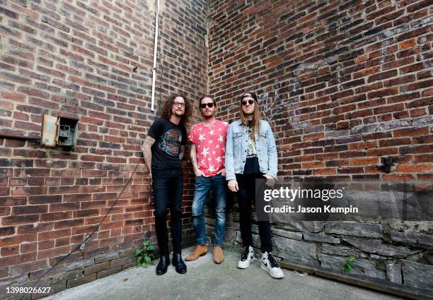 Kelby Ray, Jaren Johnston and Neil Mason of The Cadillac Three are seen outside Mercy Lounge on May 18, 2022 in Nashville, Tennessee.