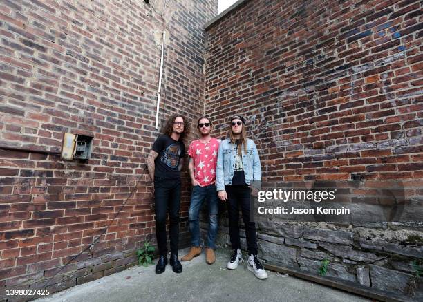 Kelby Ray, Jaren Johnston and Neil Mason of The Cadillac Three are seen outside Mercy Lounge on May 18, 2022 in Nashville, Tennessee.