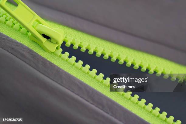 close-up of zipper - zipper stock pictures, royalty-free photos & images