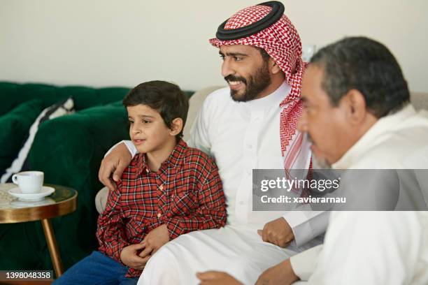 three generations of male saudi family members - saudi grandfather stock pictures, royalty-free photos & images