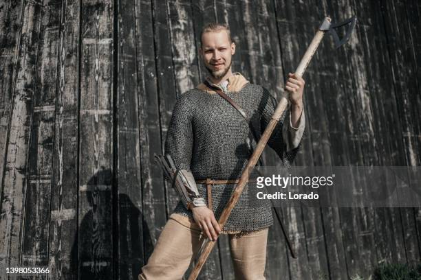 armed viking warrior guard at the gates - viking stock pictures, royalty-free photos & images