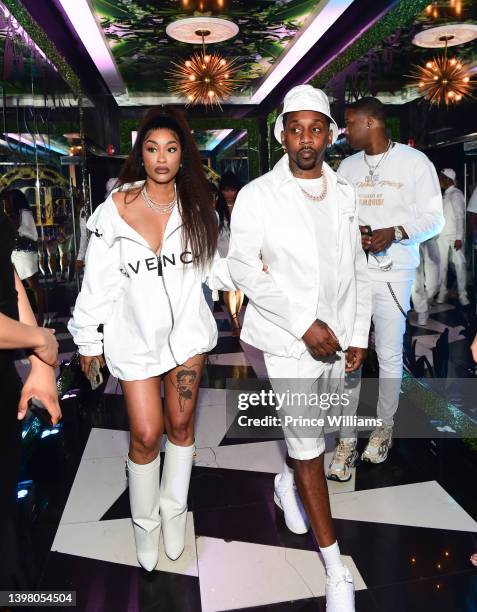 Cleopatra Bernard and Mr Rugs attend Friday All White Affair at Gold Room on May 13, 2022 in Atlanta, Georgia.