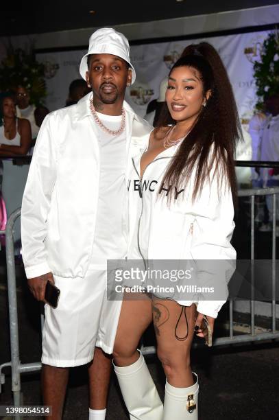 Mr Rugs and Cleopatra Bernard attend Friday All White Affair at Gold Room on May 13, 2022 in Atlanta, Georgia.