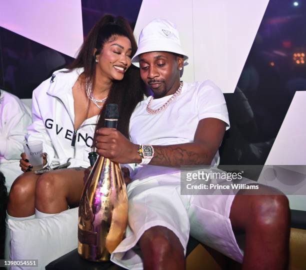 Cleopatra Bernard and Mr Rugs attend Friday All White Affair at Gold Room on May 13, 2022 in Atlanta, Georgia.