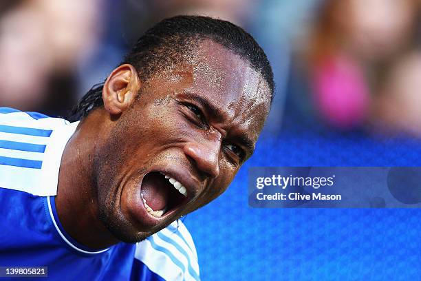 Didier Drogba of Chelsea gets treated for an injury during the Barclays Premier League match between Chelsea and Bolton Wanderers at Stamford Bridge...