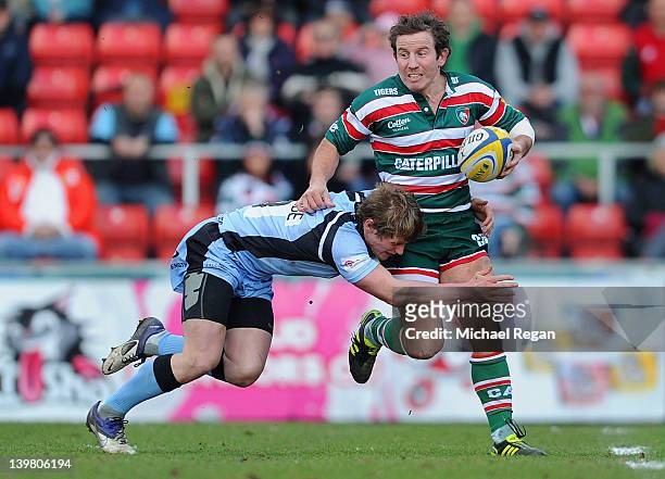 James Grindal of Tigers is tackled by Chris Pilgrim of Newcastle during the Aviva Premiership match between Leicester Tigers and Newcastle Falcons at...