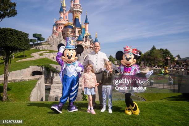 In this handout provided by Disney, Mickey, Prince Albert II of Monaco, Princess Gabriella of Monaco, Prince Jacques of Monaco and Minnie pose in...