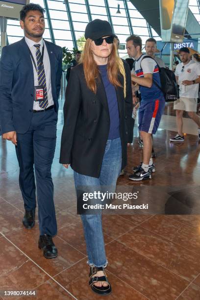 Actress Julianne Moore is seen leaving the 75th annual Cannes film festival at Nice Airport on May 19, 2022 in Nice, France.