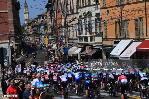 General view of the peloton passing through Parma city landscape while fans cheer at start in the 105th Giro d'Italia 2022, Stage 12 a 204km stage...