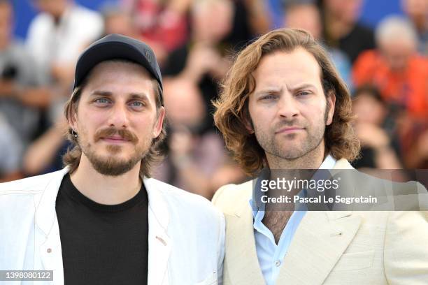 Luca Marinelli and Alessandro Borghi attends the photocall for "The Eight Mountains " during the 75th annual Cannes film festival at Palais des...