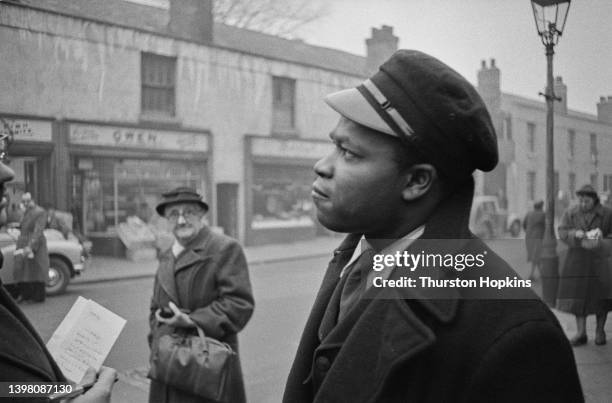 Bus conductor and radio technician Rue Gordon in Birmingham, UK. Original Publication: Picture Post - 7482 - Vol 66 No 4 - Are we building up to a...