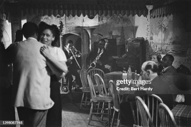 Couples dancing in a bar to a live band, UK, 1949. Original publication: Picture Post - 4825 - Is There A British Colour Bar? - Vol 44 No 1 - pub....