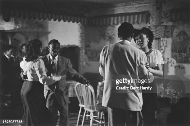 Couples dancing in a bar to a live band, UK, 1949. Original publication: Picture Post - 4825 - Is There A British Colour Bar? - Vol 44 No 1 - pub....