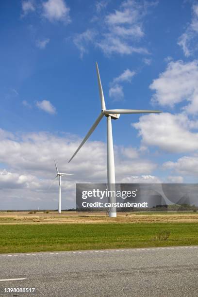 wind turbine in a flat landscape - air date stock pictures, royalty-free photos & images