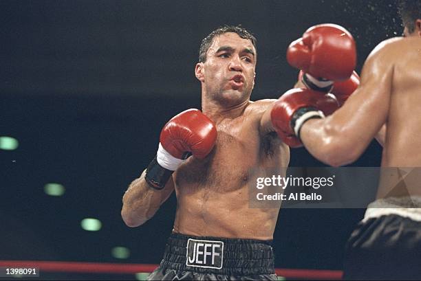 Jeff Fenech lands a straight left on Tialano Tovar during a bout. Fenech won the fight with a technical knockout in the eighth round. Mandatory...