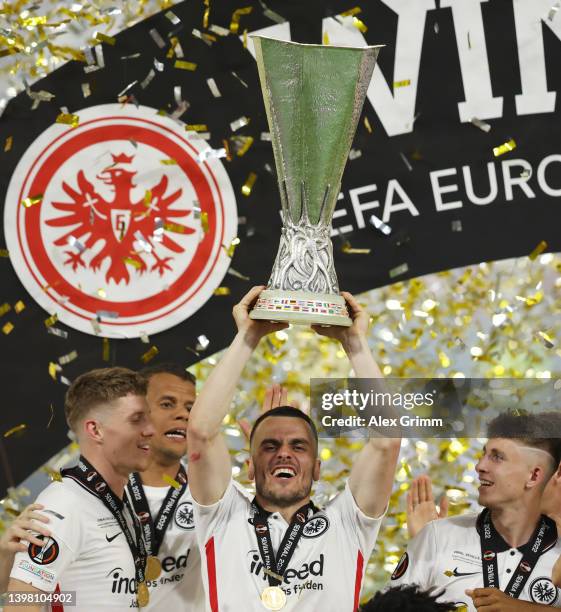 Filip Kostic of Eintracht Frankfurt lifts the UEFA Europa League Trophy following their team's victory in the UEFA Europa League final match between...