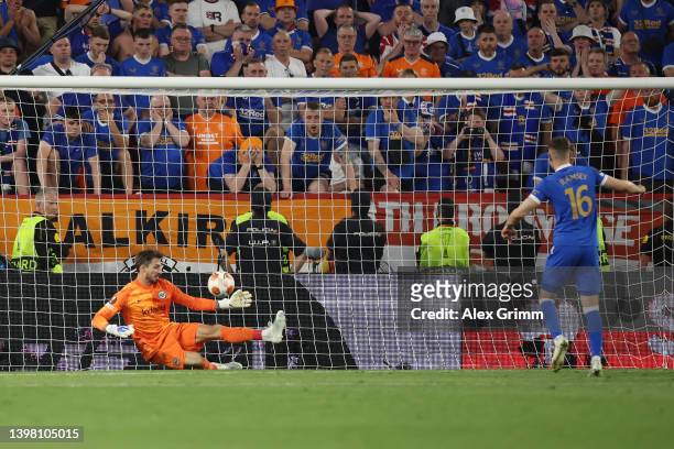Kevin Trapp of Eintracht Frankfurt saves the fourth penalty from Aaron Ramsey of Rangers in the penalty shoot out during the UEFA Europa League final...