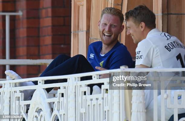 Ben Stokes and Scott Borthwick of Durham laugh on the dressing room balcony during the LV= Insurance County Championship match between Middlesex and...