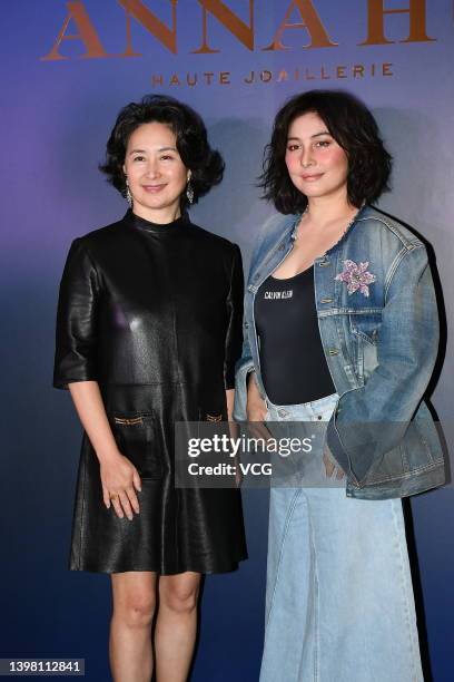 Pansy Ho and Josie Ho, daughters of Hong Kong-Macao billionaire businessman Stanley Ho Hung-sun, attend Anna Hu jewelry event on May 19, 2022 in Hong...