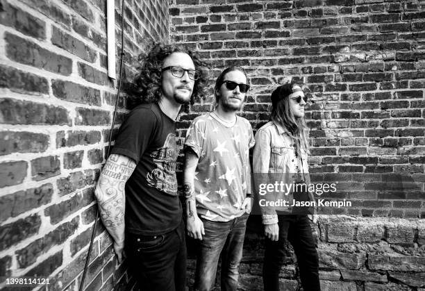 Kelby Ray, Jaren Johnston and Neil Mason of The Cadillac Three are seen outside Mercy Lounge on May 18, 2022 in Nashville, Tennessee.