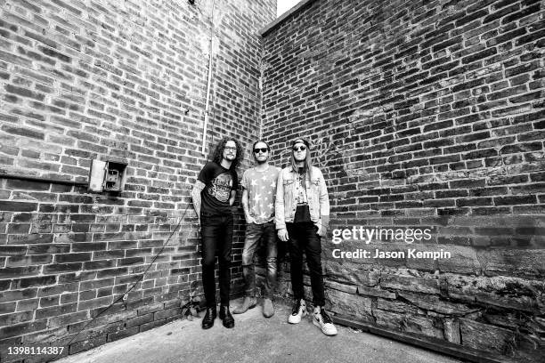 Kelby Ray, Jaren Johnston and Neil Mason of The Cadillac Three are seen outside Mercy Lounge on May 18, 2022 in Nashville, Tennessee.