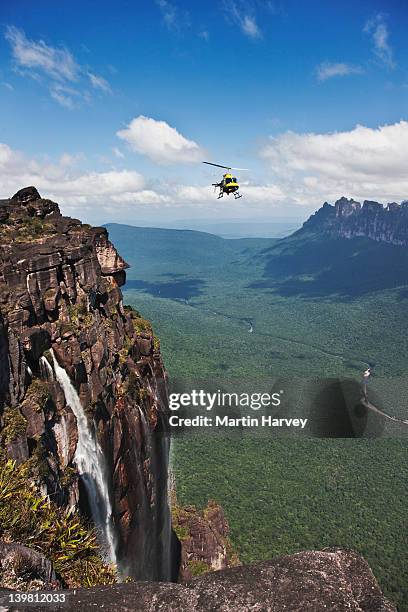 helicopter over angel falls, canaima national park, venezuela, south america - angel falls fotografías e imágenes de stock