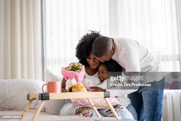coffee in bed on mother's day - mother's day breakfast stock pictures, royalty-free photos & images