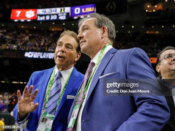 Head Coach Nick Saban of the Alabama Crimson Tide and Head Coach Jimbo Fisher of the Texas A&M Aggies on the sidelines talking during of the College...