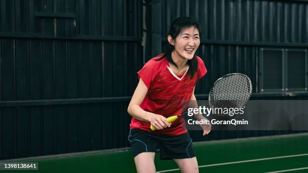《badminton spirit》happily warm up - badminton smash stock pictures, royalty-free photos & images