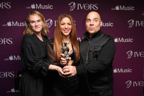 Shakira and Merck Mercuriadis pose for a photo after receiving the Special International Award with Apple Music during The Ivor Novello Awards 2022...