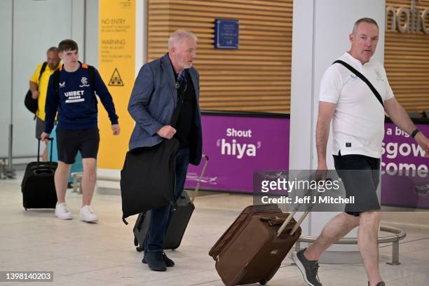 Former Rangers player Ally McCoist arrives back with fans as they return to Glasgow Airport after watching their team in the Europa League final on...