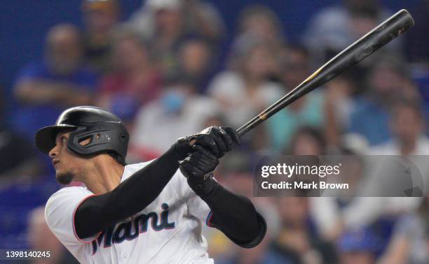 Erik Gonzalez of the Miami Marlins bats against the Milwaukee Brewers at loanDepot park on May 15, 2022 in Miami, Florida.