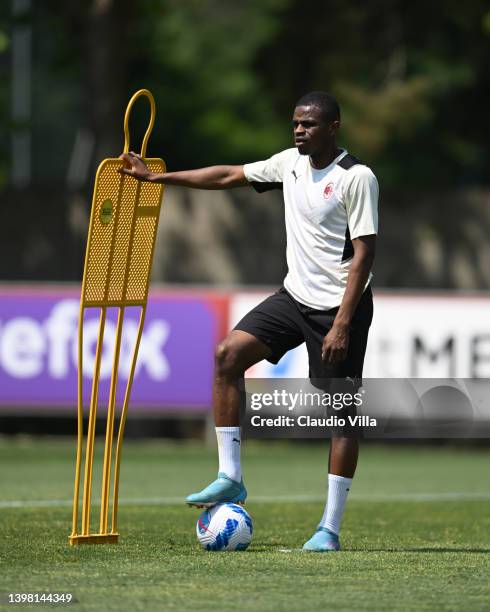 Pierre Kalulu of AC Milan in action during AC Milan training session at Milanello on May 19, 2022 in Cairate, Italy.