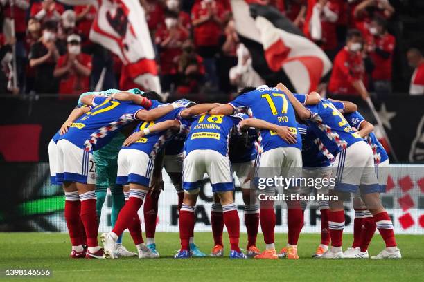 Players of Yokohama F.Marinos huddle during the J.LEAGUE Meiji Yasuda J1 11th Sec. Match between Urawa Red Diamonds and Yokohama F･Marinos at Saitama...