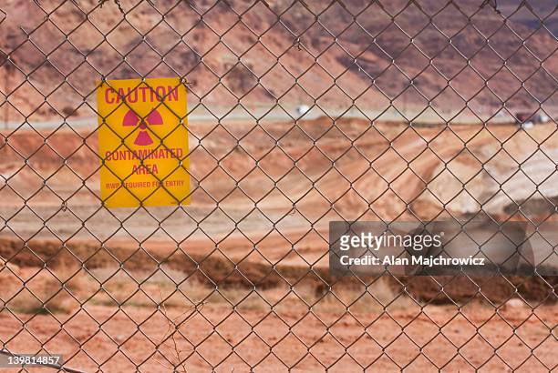 umtra project site along the colorado river near moab, utah, usa. radioactive uranium tailings are being dug up and moved to another site to avoid leaching into the colorado river. - radiation symbol stock pictures, royalty-free photos & images
