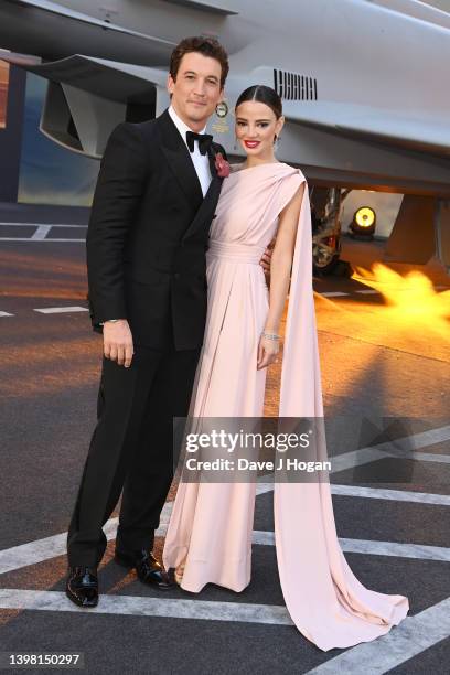 Miles Teller and Keleigh Sperry attend the "Top Gun: Maverick" Royal Film Performance at Leicester Square on May 19, 2022 in London, England.