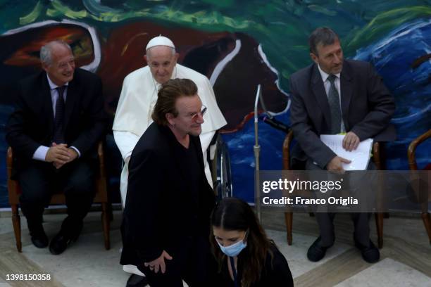 Pope Francis takes part in the festive launch of the Scholas Occurrentes International Movement, with U2 singer Bono Vox and José Maria del Corral ,...