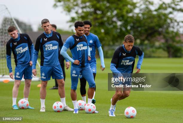 Players seen L-R Elliot Anderson, Ciaran Clark, Jacob Murphy, Jamal Lewis and Dwight Gayle warm up during the Newcastle United Training session at...
