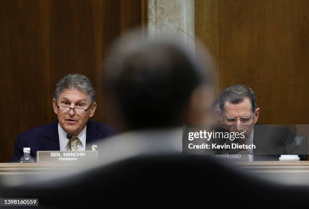 Sen. Joe Manchin , Chairman of the Senate Energy and Natural Resources Committee, joined by Sen. John Barasso listens as Interior Secretary Deb...