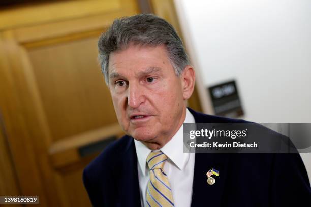 Sen. Joe Manchin , Chairman of the Senate Energy and Natural Resources Committee, talks to reporters before a hearing with Interior Secretary Deb...