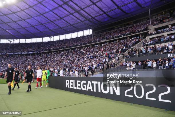 Both sides enter the pitch prior to the Bundesliga Playoffs Leg One match between Hertha BSC and Hamburger SV at Olympiastadion on May 19, 2022 in...