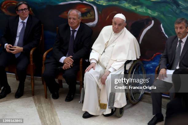 Pope Francis takes part in the festive launch of the Scholas Occurrentes International Movement, with U2 singer Bono Vox and José Maria del Corral ,...