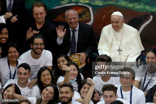 Pope Francis takes part in the festive launch of the Scholas Occurrentes International Movement, with U2 singer Bono Vox and José Maria del Corral ,...