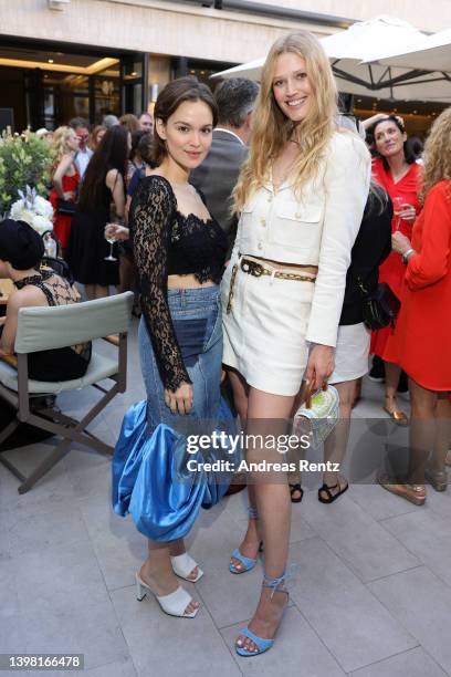 Emilia Schüle and Toni Garrn attend a cocktail reception celebrating more than a century of filmmaking in Europe commemorating 110 years of Studio...