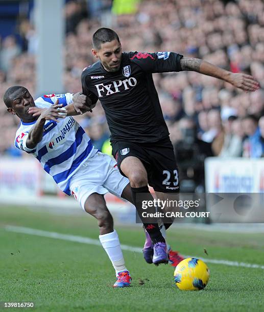 Fulham's US midfielder Clint Dempsey vies with Queens Park Rangers' English midfielder Shaun Wright-Phillips during the English Premier League...