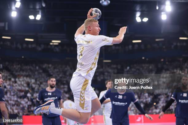 Sven Ehrig of Kiel scores during the EHF Champions League quarter final second leg match between THW Kiel and Paris Saint-Germain at Wunderino Arena...